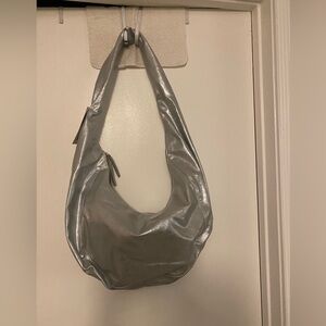 NWT Urban Outfitters silver metallic shoulder bag crossbody. Zip closure